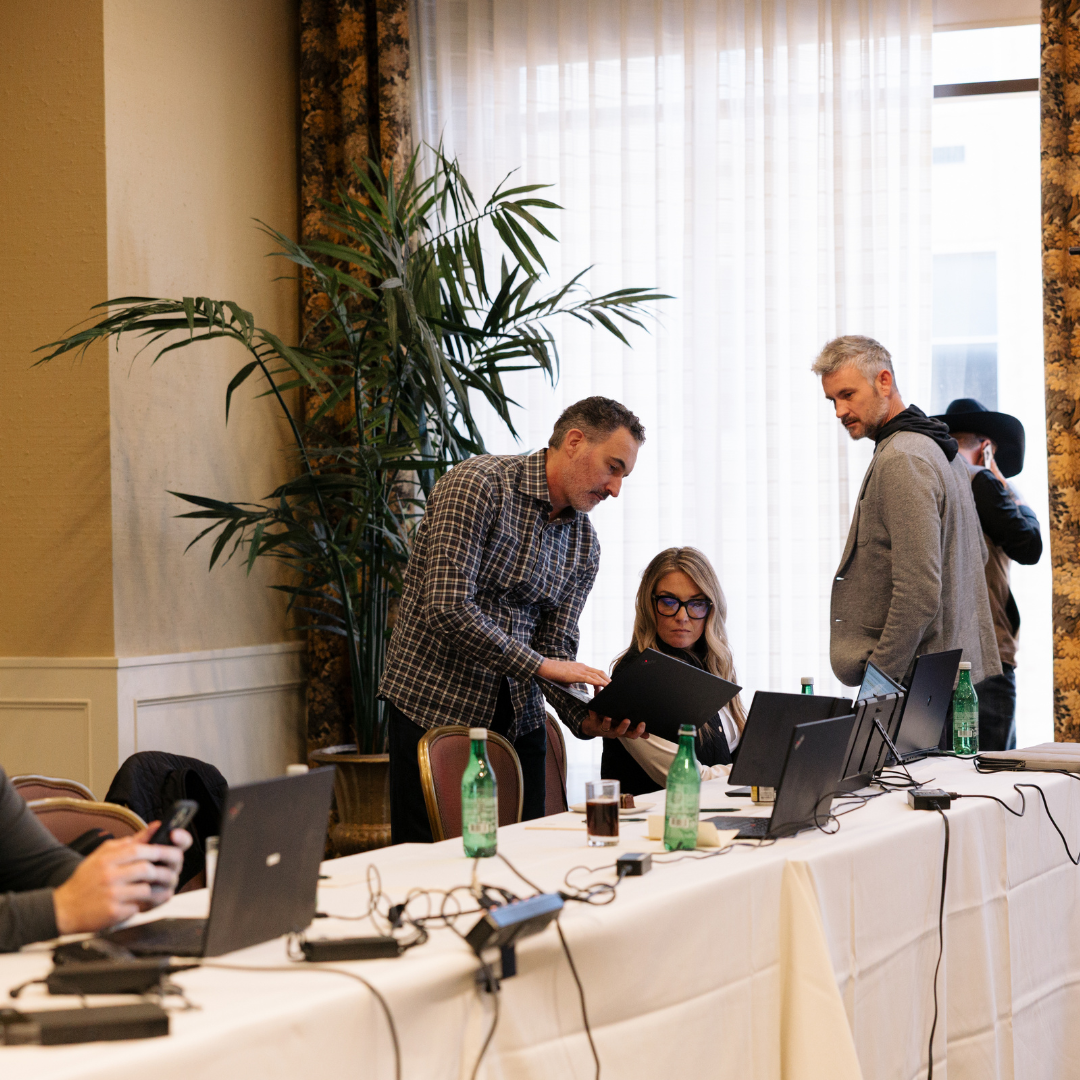 Modern Client working session at a leadership and visibility industry event, with the founder collaborating alongside attendees.